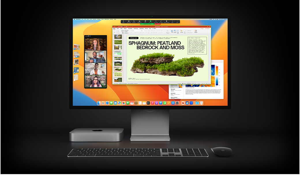 Der Mac mini mit Magic Mouse, Magic Keyboard und Studio Display, auf dem eine Microsoft PowerPoint Präsentation zu sehen ist, die in einem Zoom Meeting geteilt wird. Im Hintergrund ist die Notizen App geöffnet.